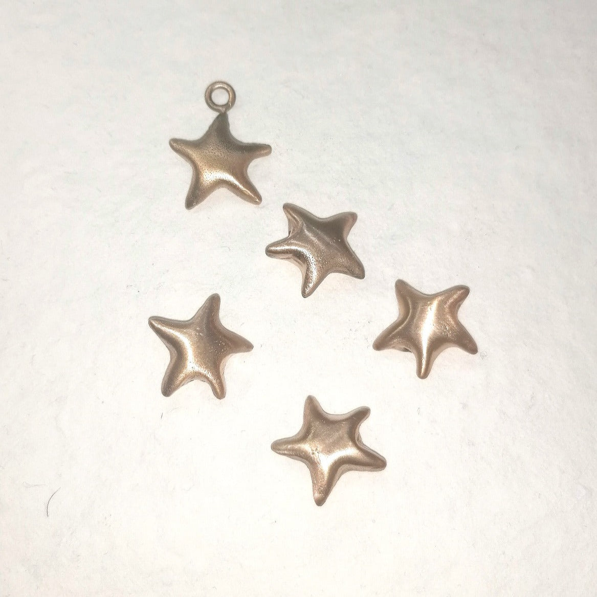 Star bracelets and pendants