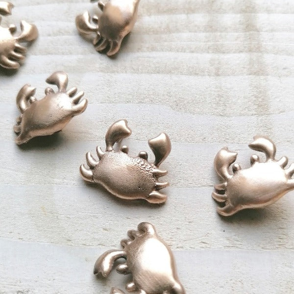 Crab bracelets and pendants 