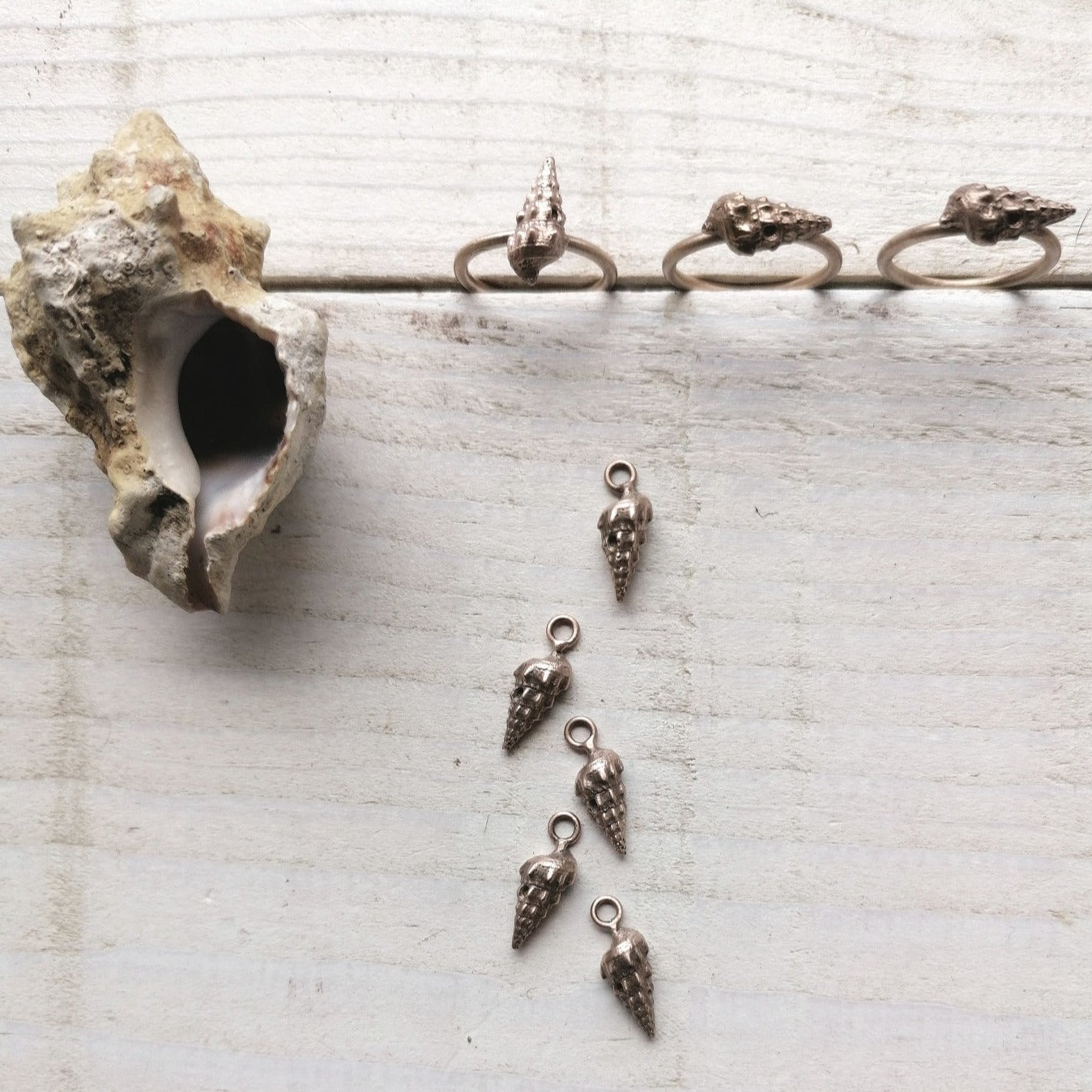 Long shell pendants
