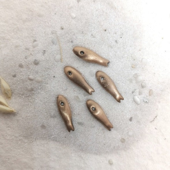 Anchovy bracelets and pendants